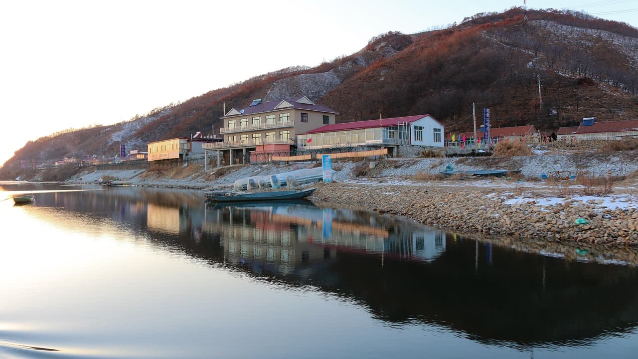 Kim Jong-un makes first known trip abroad in over a year, crossing new Yalu River bridge into China
